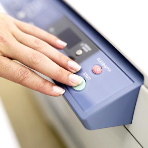 Womans Hand by Photocopier